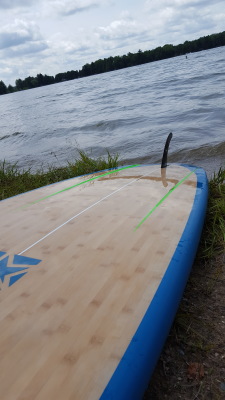 paddleboard on shore