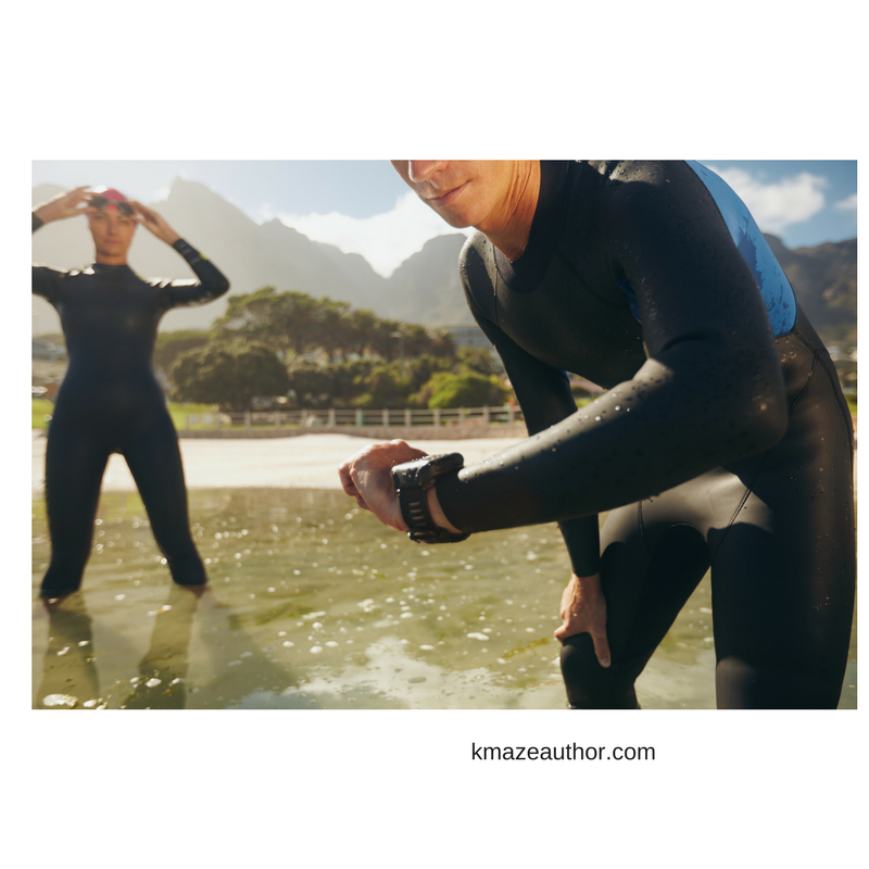 man in wetsuit instructing